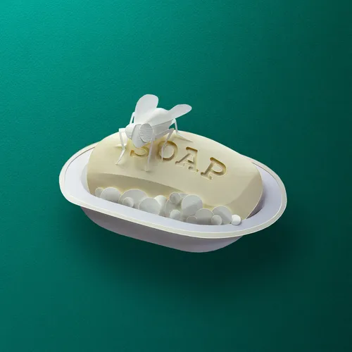 Papierskulptur einer schmutzigen Seifenschale