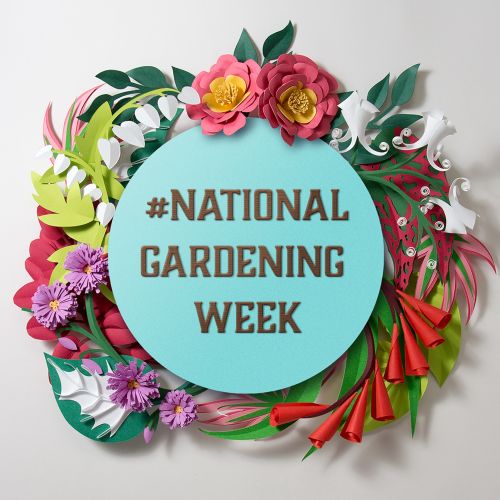 Paper spring flowers decorate a roundel for #NationalGardeningWeek