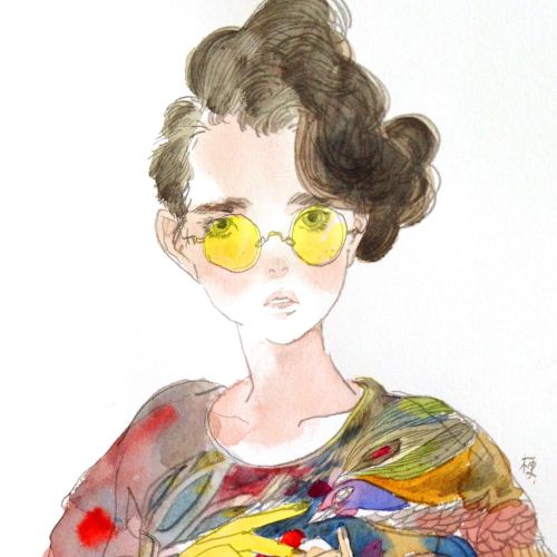 Fashion woman with yellow glasses
