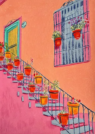 Staircase with potted plants on railing and window on peach wall