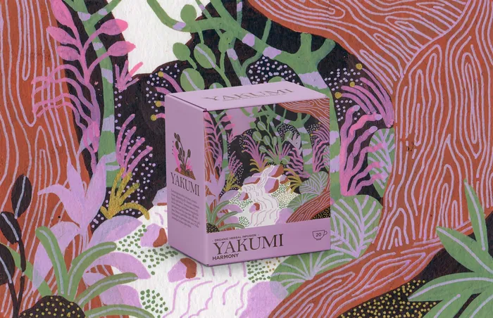 Pink packaging box with floral jungle design on colorful background
