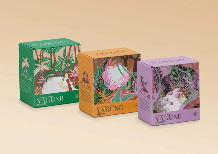Three Yakumi tea boxes with green, orange, and purple botanical designs