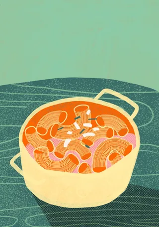 Pot of macaroni and cheese pasta on a table