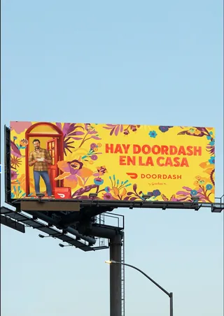 Colorful Doordash billboard celebrating Latin culture and food