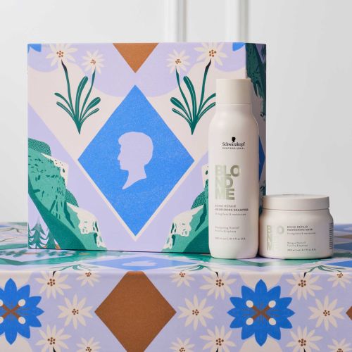 Hair care products next to decorative box with floral and silhouette designs by Gina Rosas Moncada