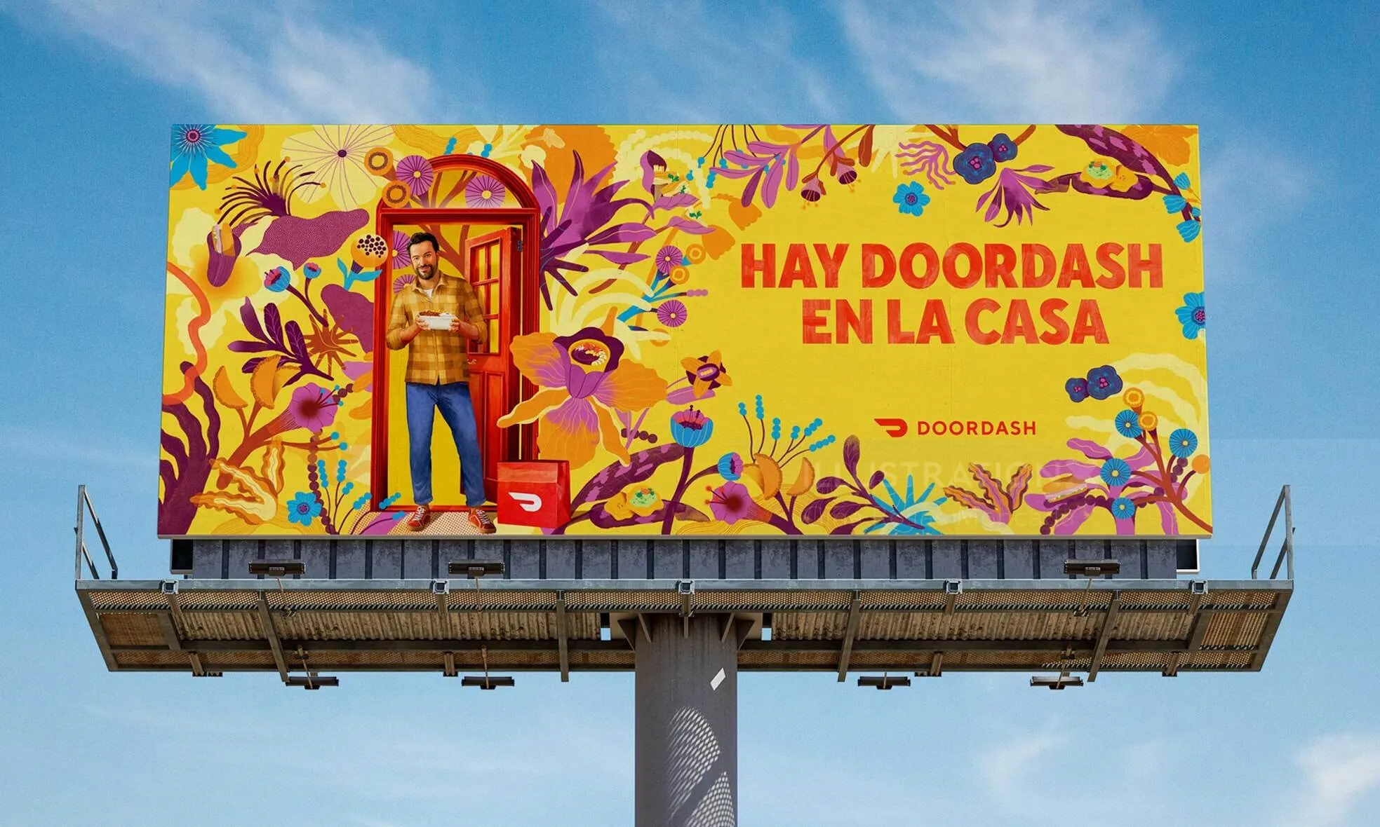 Gina Rosas Moncada billboard for DoorDash shows colorful Spanish lettering and tropical food deliver