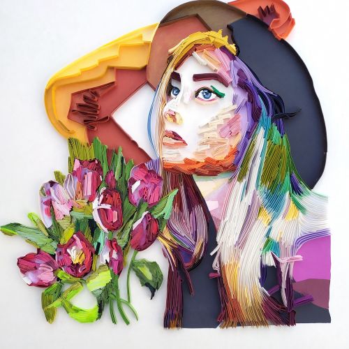 3D paper quilling art of woman with hat holding bouquet by Glimpsecraft