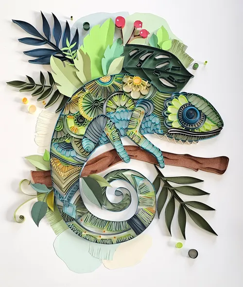 Colorful 3D paper quilling chameleon sculpture on a branch by Glimpsecraft