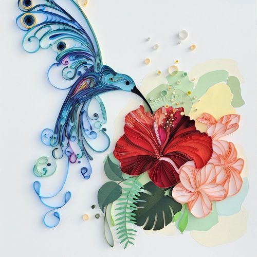 Paper quilling art of a vibrant hummingbird with red and pink flowers by Glimpsecraft