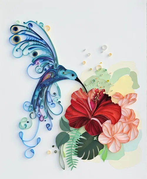 Paper quilling art of a vibrant hummingbird with red and pink flowers by Glimpsecraft