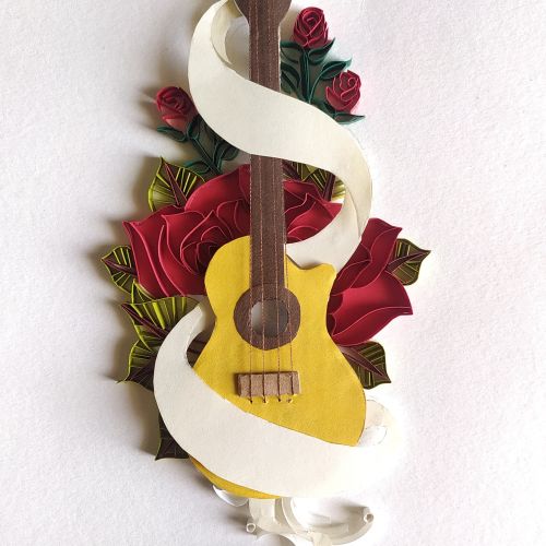 Quilled red roses and a yellow guitar with curled white accents by Glimpsecraft