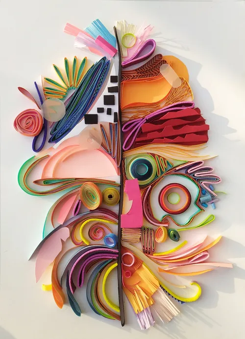 Colorful paper art depicting the duality of the human mind by Glimpsecraft