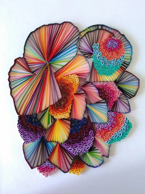 Intricate on-edge quilling artwork with vibrant paper strips by Glimpsecraft