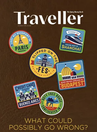Traveller magazine cover with travel destination stickers and cautionary text.
