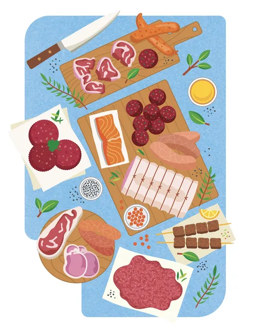 Various cuts of meat, salmon, sausages, and herbs arranged on boards