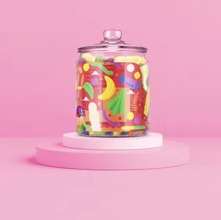 Glass jar filled with colorful abstract shapes on pink platform