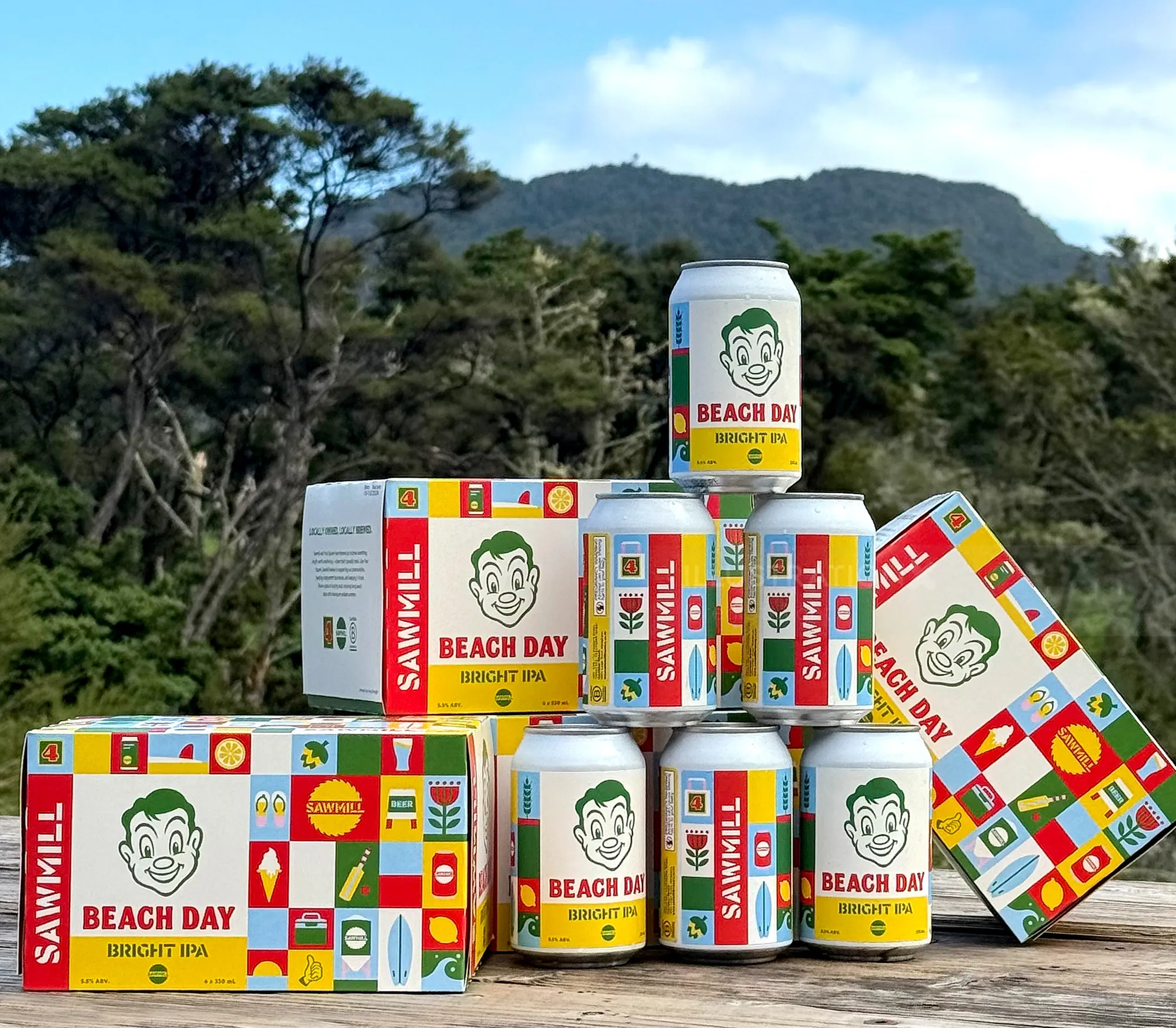 Beach Day Bright IPA cans and boxes displayed outdoors by Greg Straight