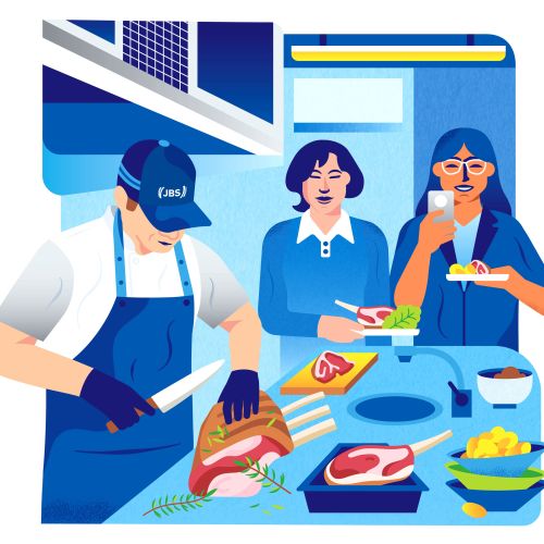 Chef slicing meat as two women eat and watch in kitchen by Greg Straight