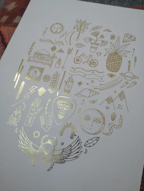 Gold foil tropical and mythical illustrations on white paper by Hannah Davies
