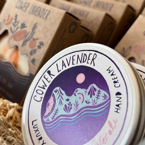 Cowper Lavender hand cream tin with purple mountain design by Hannah Davies