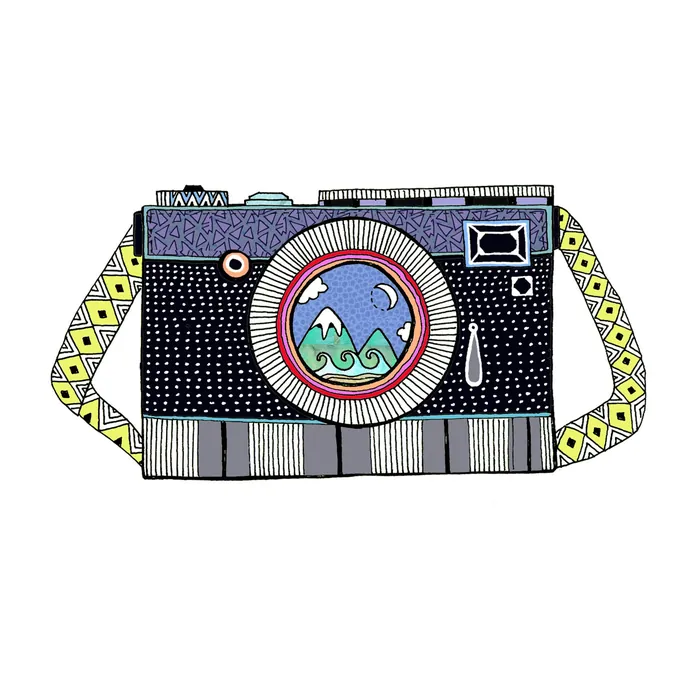 Illustration of a vintage camera with mountains inside the lens