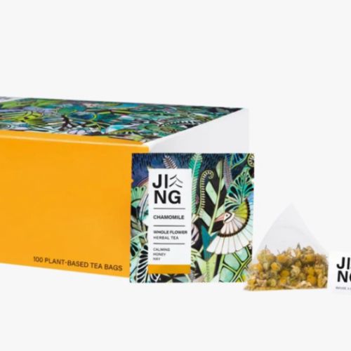 Jing chamomile tea box with yellow and floral packaging by Hannah Davies