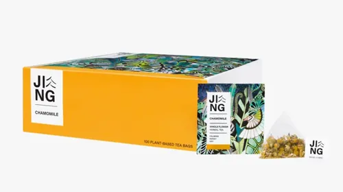Jing chamomile tea box with yellow and floral packaging by Hannah Davies