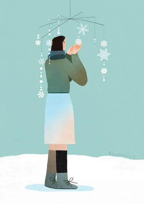 Person holding snowflake mobile with winter outfit by Hao Hao