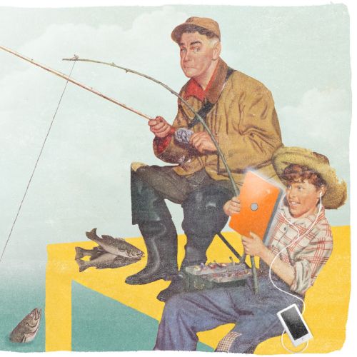 Boy and his father fishing together from a pier