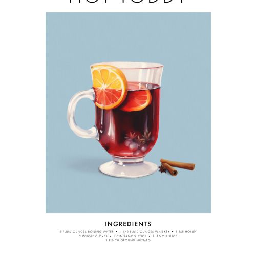 Hot toddy drink with lemon slice and cinnamon sticks