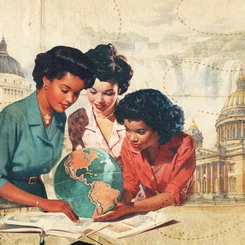 Three women examining a globe with Paris landmarks in the background