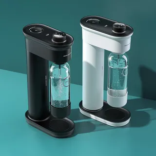 Black and white Grohe BlueFizz water carbonation machines with bottles