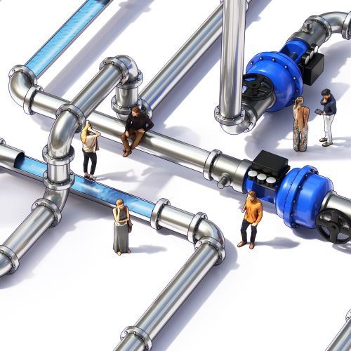 Tiny people interacting around large metal water pipes and valves.