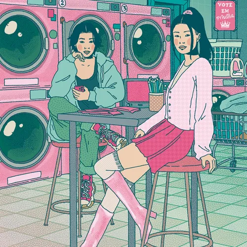 Two young women sitting in laundromat with pink and teal machines