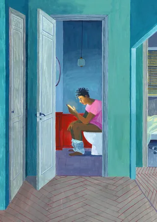 Person sitting on toilet reading book in blue room by Iratxe López de Munáin