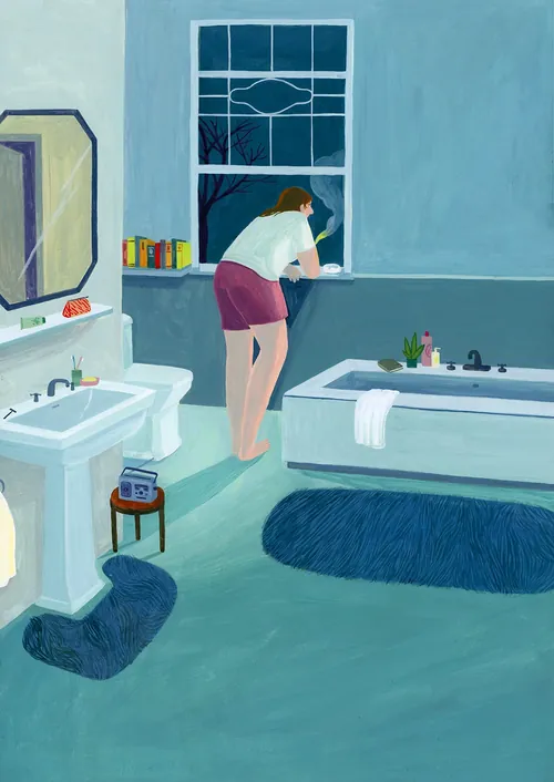 Woman leaning on bathroom windowsill by Iratxe López de Munáin