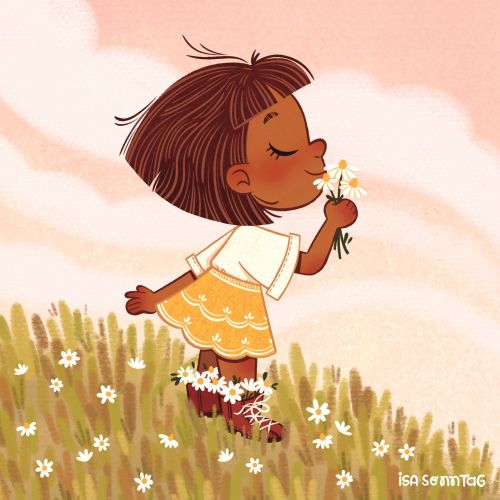 Girl smelling a daisy in a flower field at sunset