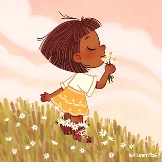 Girl smelling a daisy in a flower field at sunset