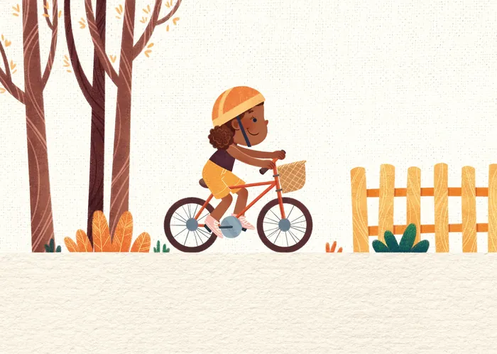 Child riding bicycle wearing helmet near trees and fence