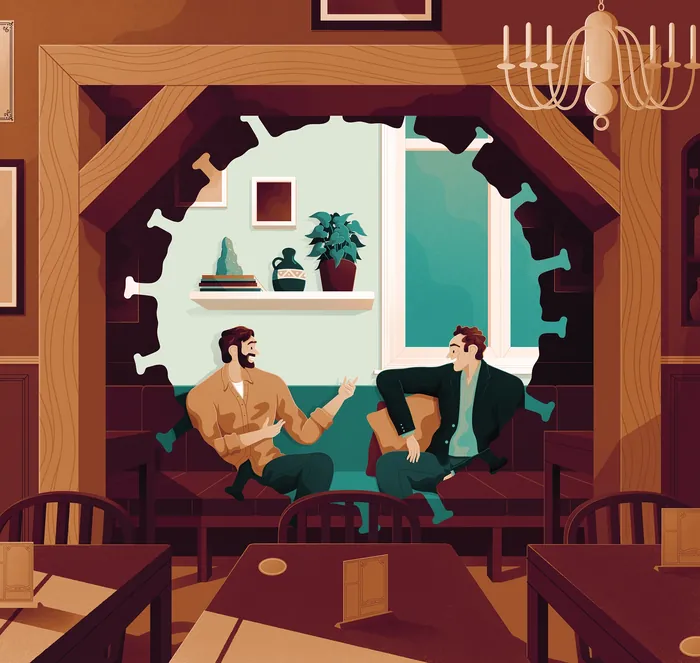 Two men talking in cozy café interior by Jacob Stead