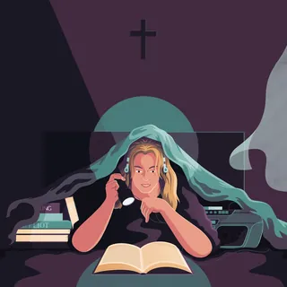 Person reading a book under a blanket by candlelight with cross nearby by Jacob Stead