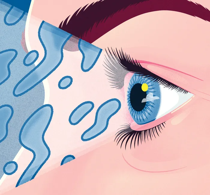 Close-up blue eye with water drops by Jacob Stead