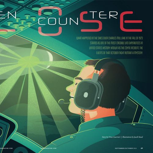 Pilot operating aircraft cockpit with illuminated radar and controls