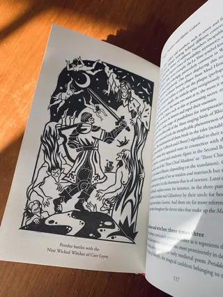 Black and white illustration of a knight with a sword amidst trees