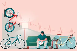 Man sitting on couch surrounded by four bikes with heartbeat line background