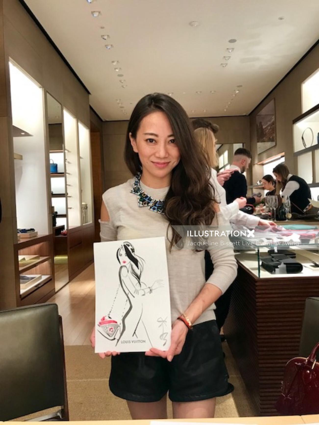 Beauty woman posing with her drawing
