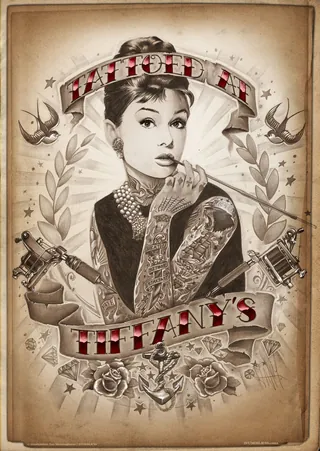 Sepia portrait of a tattooed woman with vintage style by Jan Meininghaus