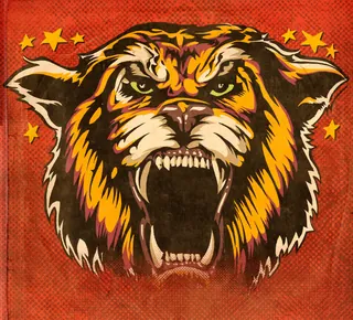 Roaring tiger head with stars on red background by Jan Meininghaus