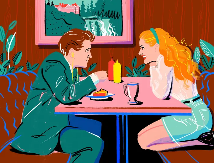 Couple dining at diner booth with ketchup and mustard bottles by Jessine Hein