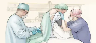 Medical staff performing epidural anesthesia on patient in hospital